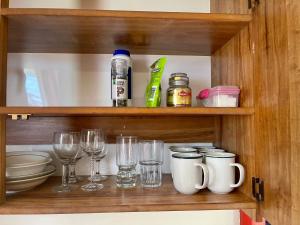 A cozinha ou kitchenette de Basic, Super 'Cosy' Cabin in The Middle of National Park and Mountains