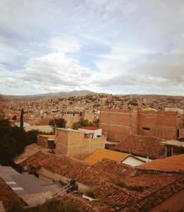 a view of a city with buildings and roofs at Departamento a 2 cuadras de plaza in Ayacucho