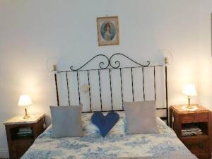 Postel nebo postele na pokoji v ubytování MAISON des FORGES