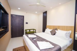 Voodi või voodid majutusasutuse Hotel Middleton NXT toas