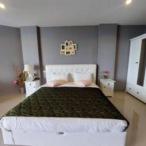 A bed or beds in a room at Krabi View ley Condo