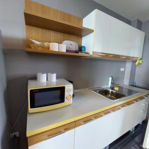 A kitchen or kitchenette at Krabi View ley Condo