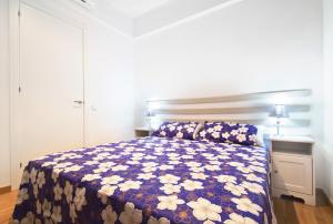 Postel nebo postele na pokoji v ubytování Apartment Gaudi XL