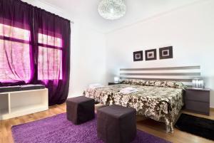 Postel nebo postele na pokoji v ubytování Apartment Gaudi XL