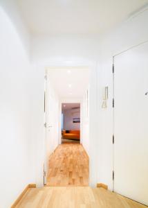 Postel nebo postele na pokoji v ubytování Apartment Gaudi XL