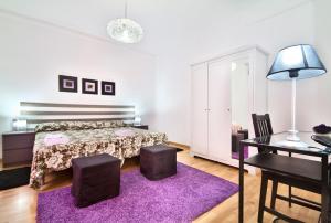 Postel nebo postele na pokoji v ubytování Apartment Gaudi XL