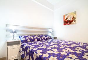 Postel nebo postele na pokoji v ubytování Apartment Gaudi XL