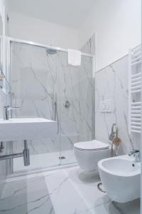 Koupelna v ubytování Correnti Boutique Luxury Rooms