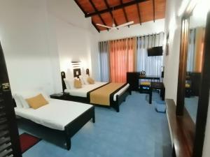 TV a/nebo společenská místnost v ubytování DALAWELLA BEACH RESORT