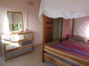 Postel nebo postele na pokoji v ubytování Villa Marie Daniel