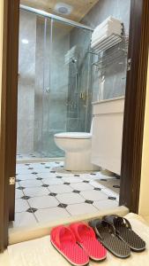 Un baño de 聚一夏民宿