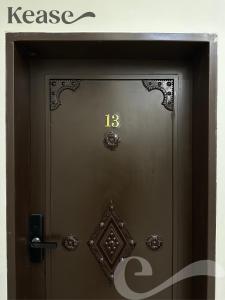 a door with the number on it at Kease Al-Mutamarat A-13 Timeless History GX22 in Riyadh