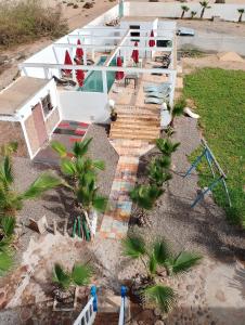 une vue aérienne sur une maison avec un escalier dans l'établissement Riad Ocean Beach Douira, à Agadir