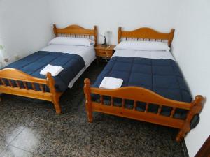 Postelja oz. postelje v sobi nastanitve Villa Los Corralillos de Pepa, en Granada.