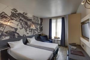 Un ou plusieurs lits dans un hébergement de l'établissement Hotel Vivaldi
