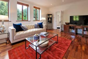 A seating area at Large & magnificent house in landscaped gardens