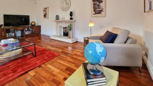 A seating area at Large & magnificent house in landscaped gardens