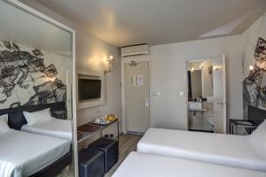 Un ou plusieurs lits dans un hébergement de l'établissement Hotel Vivaldi