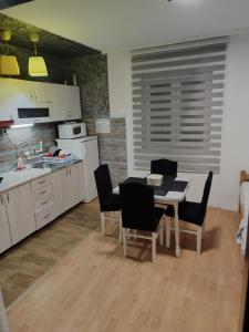 Kuršumlijska banja apartman 주방 또는 간이 주방