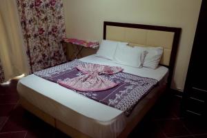 Кровать или кровати в номере Porto Matroh For Family