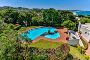 an overhead view of a swimming pool in a yard at 10 AKROTIRI, SANTORINI ESTATE - Families only in Ballito