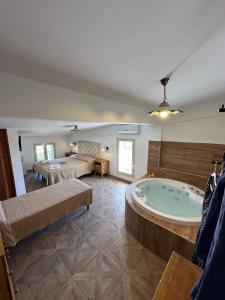 a large bathroom with a large tub in a room at B&B Villa sul Mare in Melito di Porto Salvo +171 photos