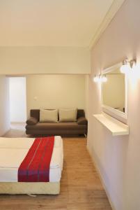 Postel nebo postele na pokoji v ubytování Rilena Hotel