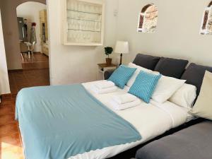 Un pat sau paturi într-o cameră la Quinta Los Tizones