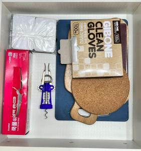 a box with a teddy bear toy and other items at Masil in Seoul