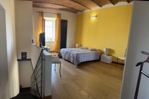 Posteľ alebo postele v izbe v ubytovaní Casa antica Maremma Toscana