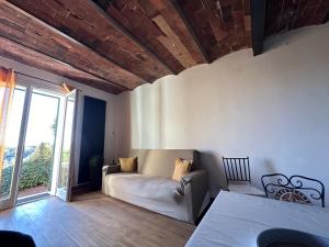 Säng eller sängar i ett rum på Casa antica Maremma Toscana