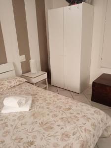 Letto o letti in una camera di Casa Dea