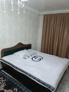 Krevet ili kreveti u jedinici u okviru objekta Уютные аппартаменты