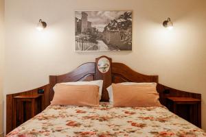 a bedroom with a bed with two pillows at B&B Vicidomini in San Marco dei Cavoti +15 photos