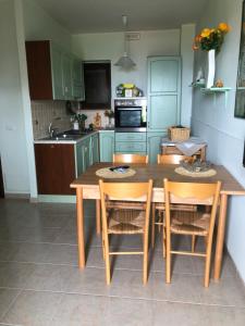 A kitchen or kitchenette at Residence l'Ogliastro
