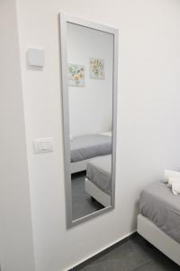 Postel nebo postele na pokoji v ubytování Da 'Nfacci Affittacamere