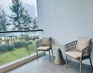 Balkón nebo terasa v ubytování Beachfront Retreats @RoxyBeachSematanApt.