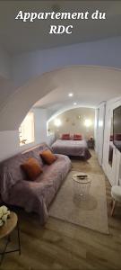 Giường trong phòng chung tại Au coeur du village de Vals