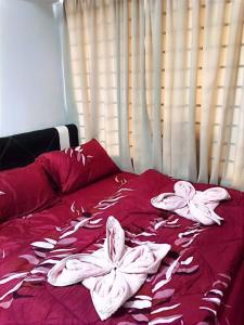 Katil atau katil-katil dalam bilik di Bidadari Lagoon 4 Islamic Homestay