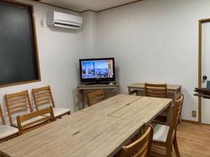 TV a/nebo společenská místnost v ubytování Sky Tree INN Ⅱ（晴樹宿Ⅱ）