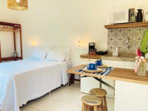 Postel nebo postele na pokoji v ubytování Meu Quintal Suítes - Búzios