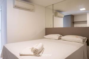 Ένα ή περισσότερα κρεβάτια σε δωμάτιο στο Solar Tambaú Flat Luxo +45 φωτογραφίες