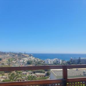 a view of the ocean from a balcony at Casa panorama 314 San Agustín Maspalomas in San Agustin