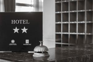 Certificat, premi, rètol o un altre document de Messini Hotel