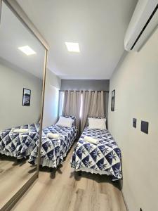 Ένα ή περισσότερα κρεβάτια σε δωμάτιο στο Lindo Apartamento com Vista Mar +25 φωτογραφίες