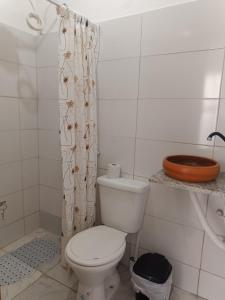 Ванная комната в Temporada Praia de Setiba