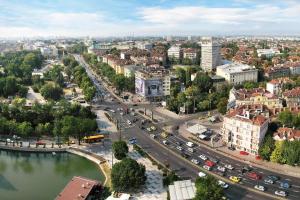 an aerial view of a city with a river and traffic at Super Fresh! 3bdr Apartment In Sofia Center's Artistic Area in Sofia