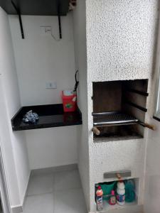 Dapur atau dapur kecil di Apartamento para 6 pessoas bairro pereque mirim