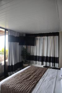 Postel nebo postele na pokoji v ubytování 180 Degrees Self-Catering