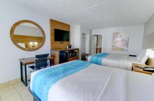 Postel nebo postele na pokoji v ubytování Oceans 2700